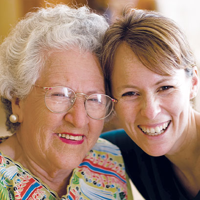 Photo of two women smiling. Links to Gifts That Protect Your Assets