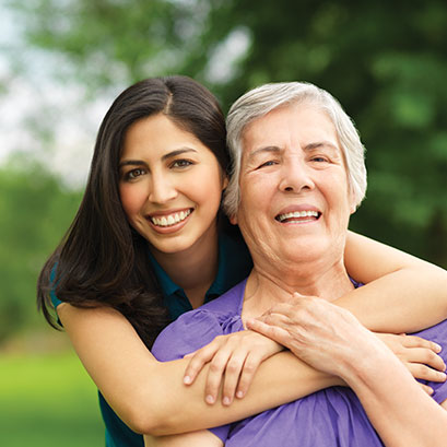 Photo of a group of people smiling. Links to Gifts of Appreciated Securities