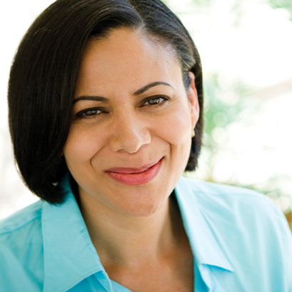 Photo of a woman smiling. Links to Assets to Give