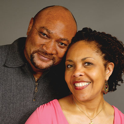 Photo of a smiling couple. Links to Gifts That Pay You Income