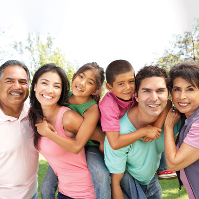 Photo of a happy family. Links to Gifts from Retirement Plans