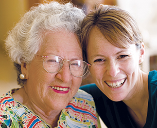 Photo of two women smiling. Links to Gifts That Protect Your Assets